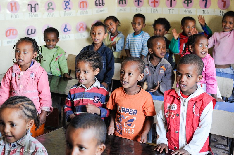 20120328_105524 Nikon D3S 2x3.jpg - Children singing at one of the school sites